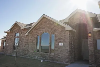 Devon Court Residences — Custom Home Builders project by Permian Homes LLC