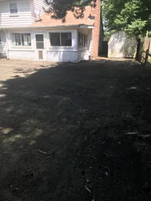 Landscaping Reset - Removal of all Beds, Re-grade of Yard, Debris Removal & Seed — Landscape Construction project by A+ Equipment Services And Excavation