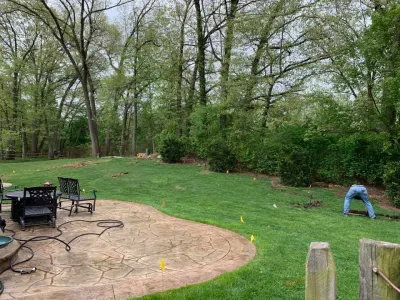 Reclaiming Back Yard with Large Retaining Wall — Landscape Construction project by A+ Equipment Services And Excavation in Holland