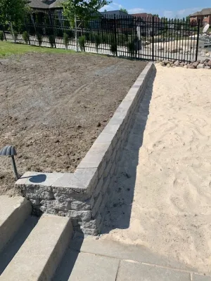 Brick Retaining Wall & Grading — Landscape Construction project by A+ Equipment Services And Excavation
