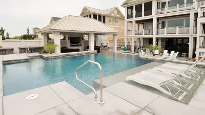 Pine Island Sanctuary • Corolla • Joyful Ours Joyful Yours — Custom Home Builders project by SAGA Realty & Construction