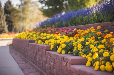 UNC Retaining Wall and Flower Bed — Landscape Construction project by All Terrain Landscaping in Greeley
