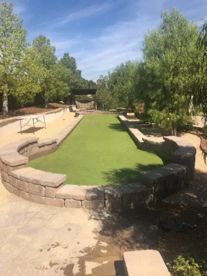 Reilly Residence - State-of-the-art backyard putting green & bocce court by Allstate Landscape & Southwest Greens
