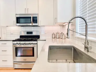 Kitchen and Fireplace Surround Renovation — Custom Home Builders project by Bend Craftsmen Company LLC
