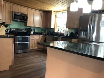 Cabinet and Flooring Renovation for the Kitchen — Custom Home Builders project by Newman Homes