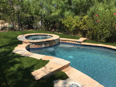 Orange County Residence - Gorgeous Pool and Spa Turf — Landscape Construction project by Allstate Landscape & Southwest Greens in Newport Beach