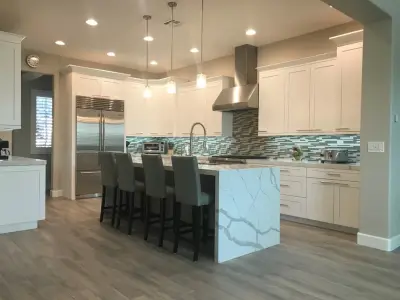 Waterfall Island Kitchen — Custom Home Builders project by Fairless Homes LLC