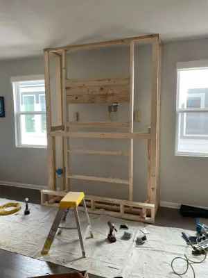 Fireplace and Staircase with New Flooring — Kitchen Remodeling project by Austin Dream Remodeling