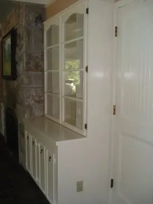 Automated Flatscreen Elevation System in Display Case — Kitchen Remodeling project by Sam Bradley Homes