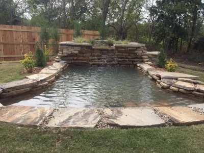 Custom Swimming Pond — Landscape Construction project by Anderson Pond Design