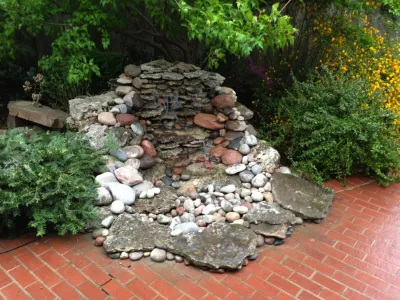 Larger Custom Waterfalls — Landscape Construction project by Anderson Pond Design