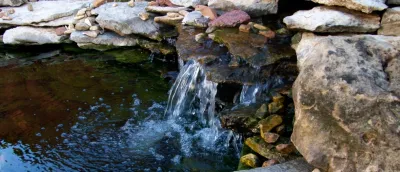 Custom Waterfall Features — Landscape Construction project by Anderson Pond Design
