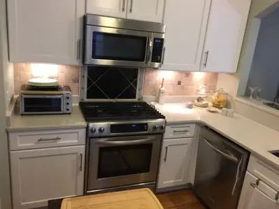 Carrara Quartz Countertop by Goia — Kitchen Remodeling project by North Lion Stone