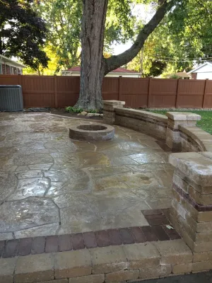 Livonia Raised Flagstone patio by Apex Landscape And Brick Services LLC