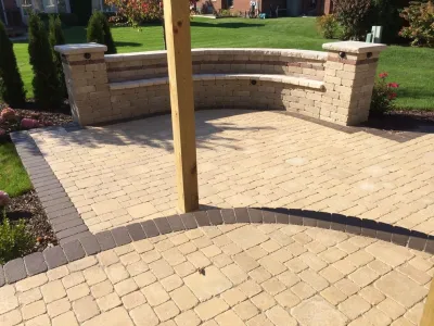 Canton Patio w/ Pergola and Outdoor Kitchen by Apex Landscape And Brick Services LLC