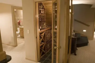 Under-Staircase Wine Storage Solution — Kitchen Remodeling project by Jacobson Construction