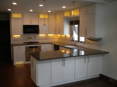 Contemporary Kitchen Renovation in Greendale Featuring White Cabinets — Kitchen Remodeling project by Advantage Design + Remodel