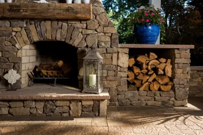 Covered outdoor area with fireplace, grill island and paver patio — Landscape Construction project by Ayers Hardscapes & Landscapes LLC in High Point