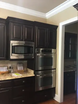 Dark Wood Cabinet Kitchen Renovation — Kitchen Remodeling project by Northshore Renovations