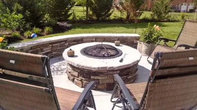 Finished pool area — Landscape Construction project by Basnight Land And Lawn Inc.