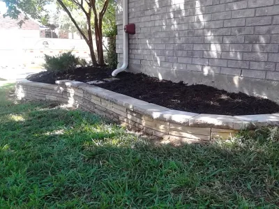 Pavestone Retaining Wall by Be Green Texas Lawn Care