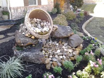 Waterfall Feature — Landscape Construction project by Be Green Texas Lawn Care in Cross Roads