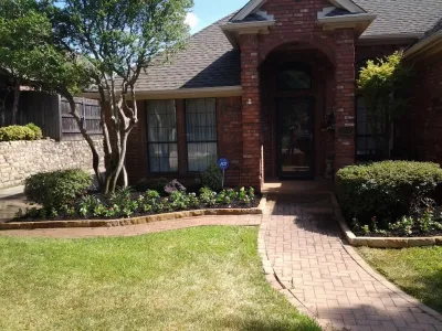 Stone Retaining Wall Flower Beds by Be Green Texas Lawn Care