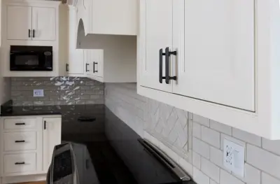 Herndon VA Kitchen Renovation with White Countertops and Wooden Flooring — Kitchen Remodeling project by Virginia Kitchen & Bath