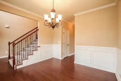 New Community Brick Front Residence — Home Renovation & Remodeling Services project by Crabbe Homes