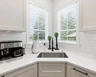 Radiant White Kitchen Complete Renovation by Casino Co. Renovations