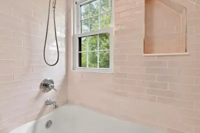 Pink Bathroom Renovation in Broad Ripple — Home Renovation & Remodeling Services project by The Lifestyle Group Inc.