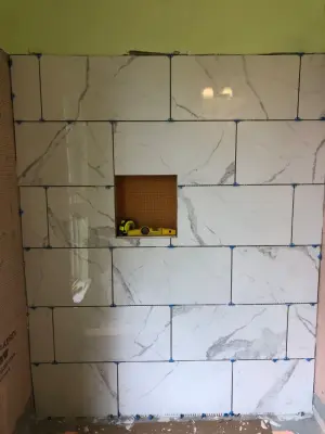Affordable Bathroom Renovation — Home Renovation & Remodeling Services project by Rainwater Builders