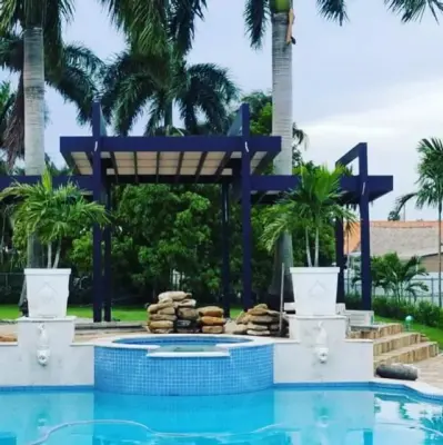 Poolside Pergola Construction — Home Renovation & Remodeling Services project by Pro Restoration Services LLC