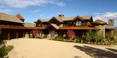 Custom Home with Heavy Stone and Timber Frame at C Lazy U Ranch, Colorado — Home Renovation & Remodeling Services project by Beck Building Company