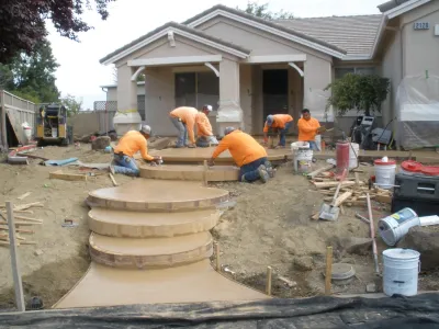 Stunning Curved Stamped Concrete Walkway — Landscape Design project by Bluestar Landscape Designers in Lincoln