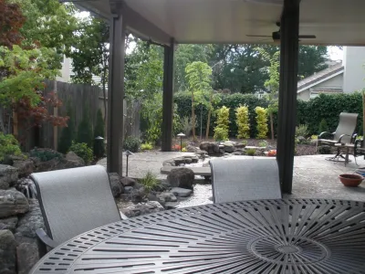 Rocklin Waterfall and Creek Running Through Patio — Landscape Design project by Bluestar Landscape Designers in Rocklin