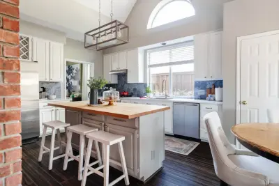 Relaxed Cobalt Kitchen Renovation by Mae Reedy Build + Design