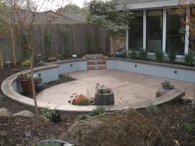 Contemporary Sunken Courtyard with Lighting and Seatwalls — Landscape Design project by Bluestar Landscape Designers in Carmichael
