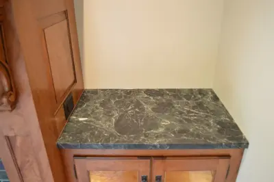 Cherry Mantel with Side Cabinets — Home Renovation & Remodeling Services project by Hand Craft By Cuffe, LLC