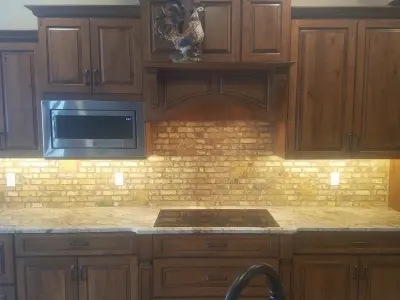 Clover Ridge Travertine Wall Tile — Home Renovation & Remodeling Services project by Weisbrich Construction, LLC