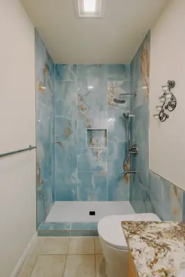 Camas, WA Coastal Blue Bathroom Renovation — Home Renovation & Remodeling Services project by Alta Casa Renovations