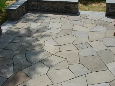 Mosaic Flagstone Patio, Seat Wall — Landscape Construction project by Bolton Landscape Design & Masonry Inc in Wilton