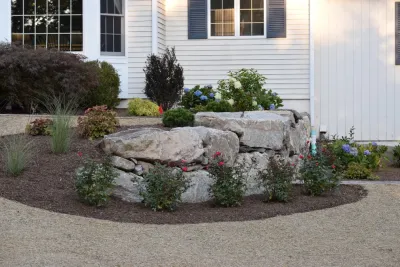 Boulder Retaining Wall & Terraced Landscaping by Bolton Landscape Design & Masonry Inc