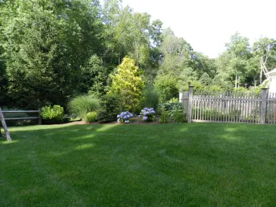 Cedar Bar and Arbor + Bocce Court by Bolton Landscape Design & Masonry Inc