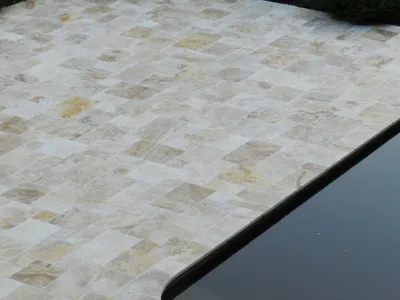 Travertine Pool Deck — Landscape Construction project by Bolton Landscape Design & Masonry Inc