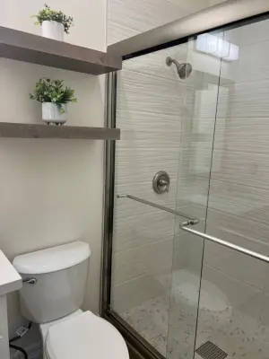 Modern Bathroom Renovation - Brownsville, TX — Home Renovation & Remodeling Services project by APB Builders - Renovations LLC