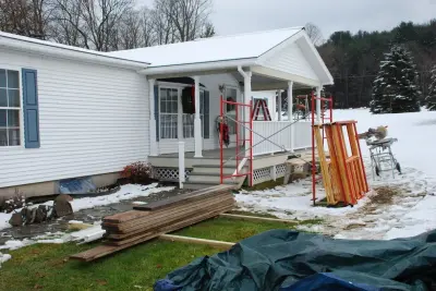 Enclosed front porch — Home Renovation & Remodeling Services project by Triangle Cabinet & Specialty Company