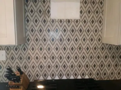 Personalized Backsplash — Home Renovation & Remodeling Services project by Dynamic Floors And More