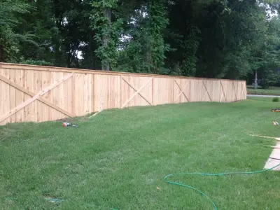 Personalized Cedar Fencing — Home Renovation & Remodeling Services project by Strickland Painting And Construction