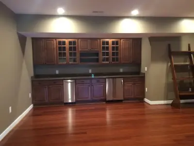 Complete Basement with Bathroom and Bar — Home Renovation & Remodeling Services project by Virginia Building And Remodeling